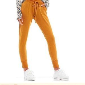 Free People Movement Gold mustard Joggers size S